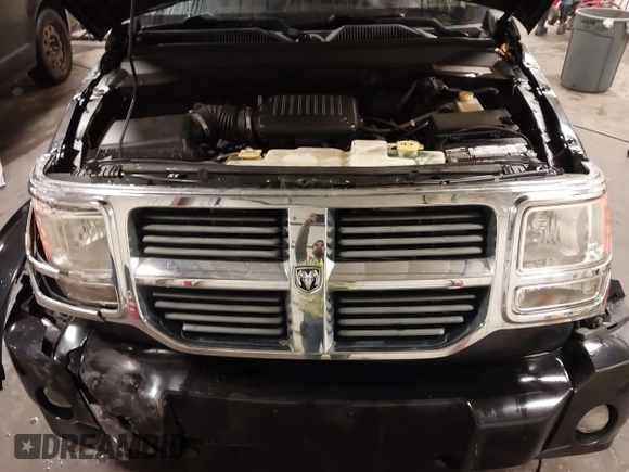 2007 Dodge Nitro SXT with VIN 1D8GU28K67W663621, listed as a IAAI auction lot 41691529 with 211,556 mi miles. Bid and sale history available at carsss.com. Image 10.