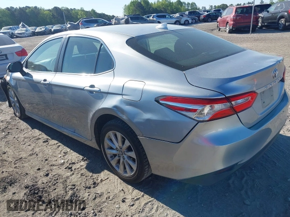 2019 Toyota Camry LE z VIN 4T1B11HK7KU756675, wystawiony jako IAAI lot #42063923 z przebiegiem 132 312 mil mil oraz . Historia ofert i sprzedaży dostępna na DreamBid. Obrazek 3.