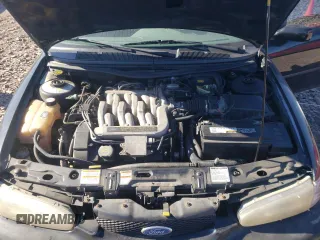 1996 Ford Contour z VIN 1FALP65L5TK212857, wystawiony jako Copart lot #76701614 z przebiegiem 74 994 mil mil oraz Szkody całkowita. Historia ofert i sprzedaży dostępna na DreamBid. Obrazek 11.