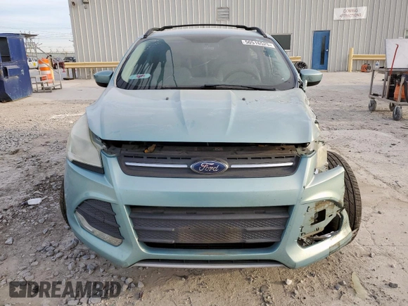2013 Ford Escape SE with VIN 1FMCU0G97DUC34491, listed as a Copart auction lot 50516525 with 133,764 mi miles and Salvage title. Bid and sale history available at DreamBid. Image 5.