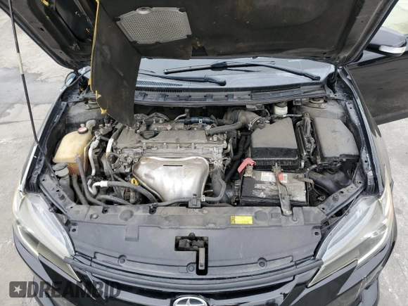 2015 Scion tC z VIN JTKJF5C75F3093123, wystawiony jako Copart lot #58414325 z przebiegiem 107 051 mil mil oraz Szkoda całkowita • Salvage title. Historia ofert i sprzedaży dostępna na DreamBid. Obrazek 11.