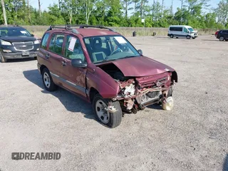 2003 Suzuki Vitara z VIN 2S3TE52V236103499, wystawiony jako IAAI lot #42285161 z przebiegiem 97 533 mil mil oraz . Historia ofert i sprzedaży dostępna na DreamBid. Obrazek 1.