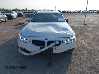 2015 BMW 4 Series 428i z VIN WBA3N7C58FK224500, wystawiony jako IAAI lot #42044727 z przebiegiem 71 815 mil mil oraz . Historia ofert i sprzedaży dostępna na DreamBid. Obrazek 6.