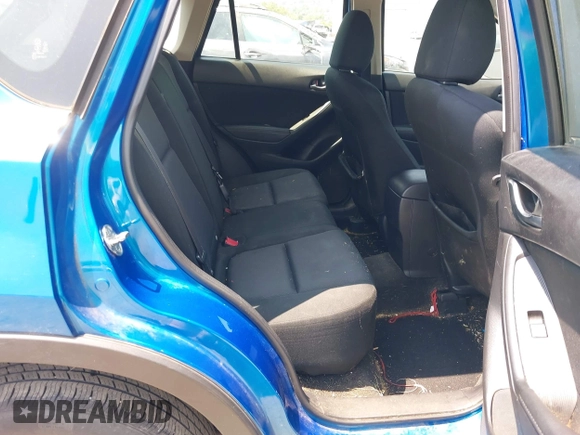 2014 Mazda CX-5 Sport z VIN JM3KE4BE4E0367444, wystawiony jako IAAI lot #42431272 z przebiegiem 181 191 mil mil oraz . Historia ofert i sprzedaży dostępna na DreamBid. Obrazek 8.