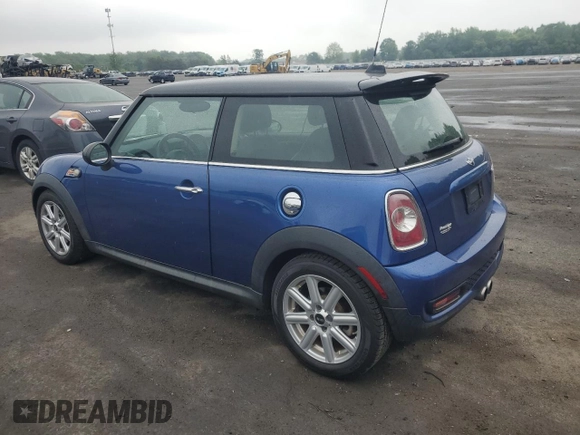 2013 MINI Hardtop S with VIN WMWSV3C55DT387777, listed as a Copart auction lot 56495215 with 53,033 mi miles and Salvage title. Bid and sale history available at DreamBid. Image 2.