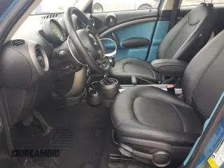 2012 MINI Countryman with VIN WMWZB3C55CWM02962, listed as a Copart auction lot 54358875 with 122,448 mi miles and Clean Title. Bid and sale history available at DreamBid. Image 7.