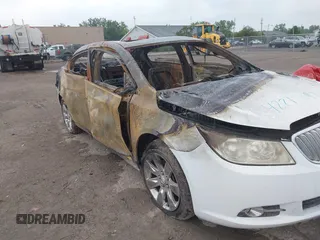 2011 Buick LaCrosse CXL z VIN 1G4GC5ED9BF120552, wystawiony jako IAAI lot #42219711 z przebiegiem Nie podano mil oraz . Historia ofert i sprzedaży dostępna na DreamBid. Obrazek 6.