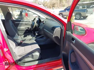 2009 Volkswagen Rabbit S with VIN WVWDB71K29W116332, listed as a IAAI auction lot 41664663 with 123,710 mi miles. Bid and sale history available at carsss.com. Image 5.