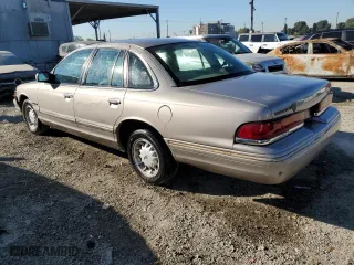 1995 Ford Crown Victoria LX with VIN 2FALP74W7SX106035, listed as a Copart auction lot 81968554 with 64,150 mi miles and Clean Title. Bid and sale history available at carsss.com. Image 2.