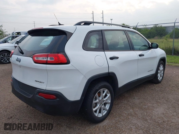 2015 Jeep Cherokee Sport with VIN 1C4PJLAB5FW761559, listed as a IAAI auction lot 41957494 with 54,614 mi miles. Bid and sale history available at carsss.com. Image 4.