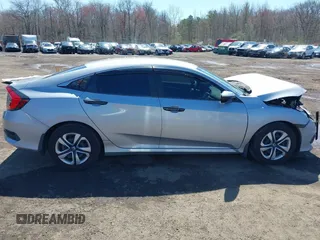 2017 Honda Civic LX z VIN 2HGFC2F53HH513655, wystawiony jako IAAI lot #41968212 z przebiegiem 112 672 mil mil oraz . Historia ofert i sprzedaży dostępna na DreamBid. Obrazek 13.