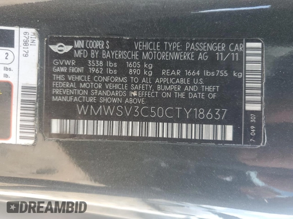 2012 MINI Hardtop S with VIN WMWSV3C50CTY18637, listed as a Copart auction lot 57771015 with 103,402 mi miles and Salvage title. Bid and sale history available at DreamBid. Image 12.