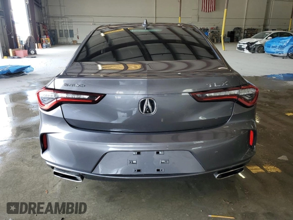 2021 Acura TLX z VIN 19UUB5F39MA015107, wystawiony jako Copart lot #51412135 z przebiegiem 47 596 mil mil oraz Szkoda całkowita • Salvage title. Historia ofert i sprzedaży dostępna na DreamBid. Obrazek 6.