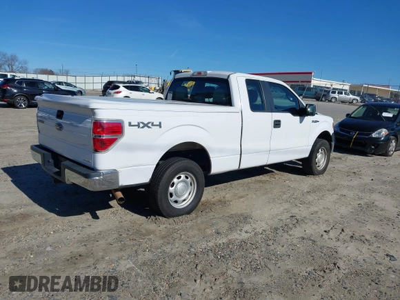 2014 Ford F-150 XL with VIN 1FTFX1EF0EKF01068, listed as a IAAI auction lot 41641910 with 212,728 mi miles. Bid and sale history available at carsss.com. Image 4.