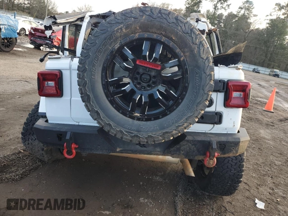 2021 Jeep Wrangler Unlimited Rubicon с VIN 1C4HJXFG1MW759580, выставлен на аукционе Copart как лот 42526775 с пробегом Не указан миль и Списание • Salvage title. История ставок и продаж доступна на DreamBid. Изображение 6.