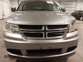 2015 Dodge Journey American Value z VIN 3C4PDCAB9FT675474, wystawiony jako IAAI lot #42078053 z przebiegiem 172 367 mil mil oraz . Historia ofert i sprzedaży dostępna na DreamBid. Obrazek 13.