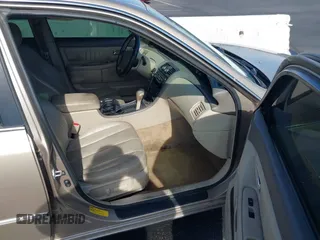 2001 Toyota Avalon XL w/Bucket Seats with VIN 4T1BF28BX1U117793, listed as a IAAI auction lot 42165172 with 247,435 mi miles. Bid and sale history available at carsss.com. Image 5.