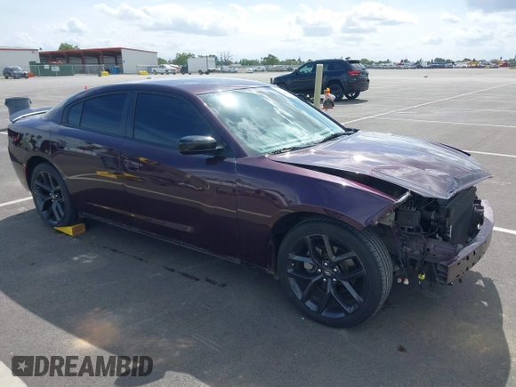 2022 Dodge Charger SXT with VIN 2C3CDXBG4NH208748, listed as a IAAI auction lot 41916434 with 54,053 mi miles and . Bid and sale history available at DreamBid. Image 1.