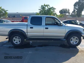 2003 Toyota Tacoma PreRunner z VIN 5TEGN92N63Z152916, wystawiony jako IAAI lot #42153765 z przebiegiem 229 221 mil mil oraz . Historia ofert i sprzedaży dostępna na DreamBid. Obrazek 13.