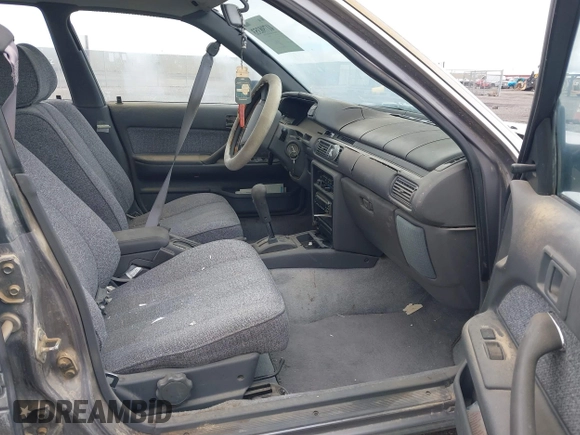 1990 Toyota Camry DLX z VIN 4T1SV21EXLU271320, wystawiony jako IAAI lot #41798353 z przebiegiem 269 178 mil mil oraz . Historia ofert i sprzedaży dostępna na DreamBid. Obrazek 5.