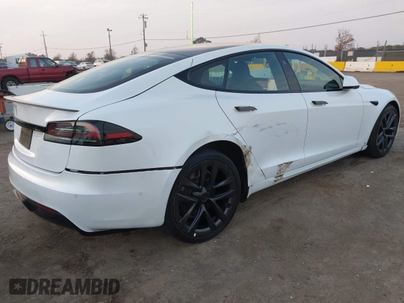 2022 Tesla Model S with VIN 5YJSA1E57NF483768, listed as a IAAI auction lot 41069339 with 35,342 mi miles and . Bid and sale history available at DreamBid. Image 4.