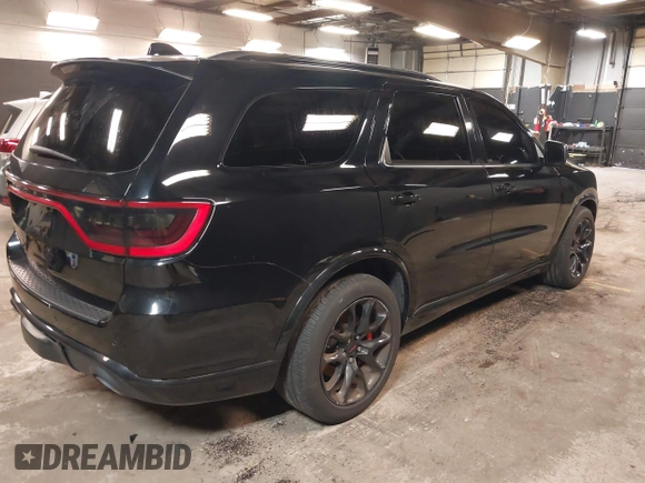 2023 Dodge Durango R/T Plus with VIN 1C4SDJCT8PC571642, listed as a IAAI auction lot 42093743 with 33,631 mi miles and . Bid and sale history available at DreamBid. Image 4.