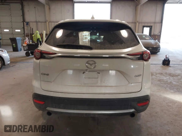 2017 Mazda CX-9 Grand Touring with VIN JM3TCADY5H0132572, listed as a IAAI auction lot 41421008 with 66,656 mi miles and . Bid and sale history available at DreamBid. Image 16.