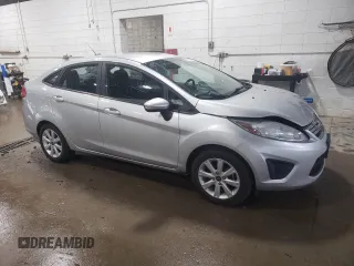 2013 Ford Fiesta SE z VIN 3FADP4BJ8DM220456, wystawiony jako Copart lot #58596825 z przebiegiem 115 933 mil mil oraz Szkoda całkowita • Salvage title. Historia ofert i sprzedaży dostępna na DreamBid. Obrazek 4.