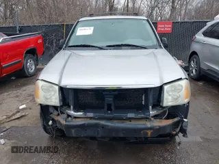 2005 GMC Envoy SLE with VIN 1GKDT13S552332088, listed as a IAAI auction lot 41699178 with 196,869 mi miles. Bid and sale history available at carsss.com. Image 13.