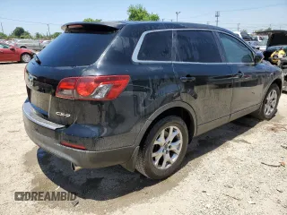 2015 Mazda CX-9 Sport z VIN JM3TB2BAXF0447315, wystawiony jako Copart lot #60842505 z przebiegiem 122 281 mil mil oraz Szkoda całkowita • Salvage title. Historia ofert i sprzedaży dostępna na DreamBid. Obrazek 3.