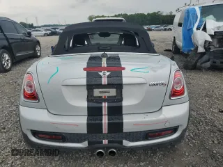 2015 MINI Roadster S z VIN WMWSY3C55FT595894, wystawiony jako Copart lot #56257194 z przebiegiem 66 704 mil mil oraz Szkody całkowita. Historia ofert i sprzedaży dostępna na DreamBid. Obrazek 6.