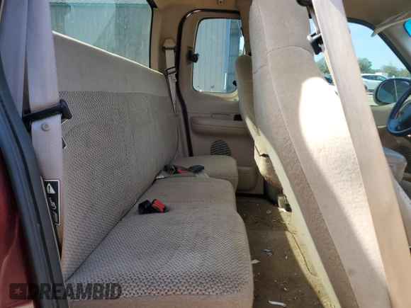 1999 Ford F-150 XL z VIN 1FTRX18L3XNA61248, wystawiony jako Copart lot #56355005 z przebiegiem Nie podano mil oraz Nie do naprawy • Non repairable. Historia ofert i sprzedaży dostępna na DreamBid. Obrazek 10.