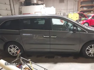 2013 Honda Odyssey EX-L с VIN 5FNRL5H63DB015989, выставлен на аукционе IAAI как лот 41832421 с пробегом 153 240 миль миль и . История ставок и продаж доступна на DreamBid. Изображение 13.