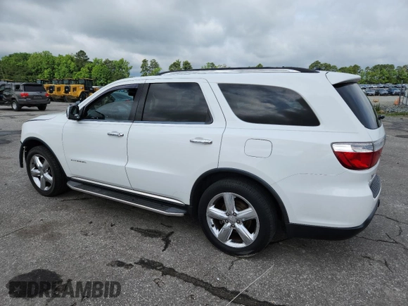 2013 Dodge Durango Citadel with VIN 1C4RDHEG6DC658958, listed as a Copart auction lot 60304945 with 209,250 mi miles and Salvage title. Bid and sale history available at DreamBid. Image 2.