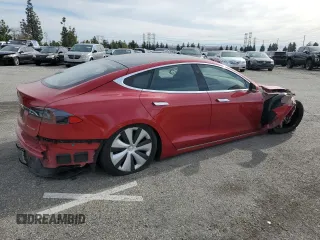 2020 Tesla Model S Long Range with VIN 5YJSA1E22LF401139, listed as a Copart auction lot 44770285 with 128,685 mi miles and Salvage title. Bid and sale history available at DreamBid. Image 3.