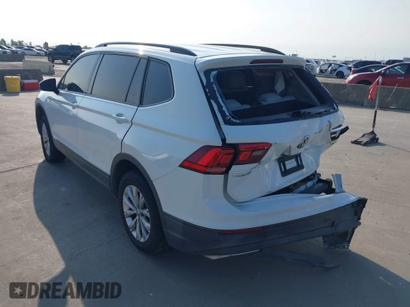 2018 Volkswagen Tiguan S with VIN 3VV1B7AX1JM119971, listed as a IAAI auction lot 42039977 with 108,932 mi miles and . Bid and sale history available at DreamBid. Image 3.