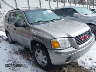 2002 GMC Envoy SLT with VIN 1GKDT13S722494588, listed as a IAAI auction lot 41623343 with 82,063 mi miles. Bid and sale history available at carsss.com. Image 1.