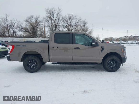 2023 Ford F-150 XL with VIN 1FTFW1E85PFA33757, listed as a IAAI auction lot 41266489 with 8,655 mi miles. Bid and sale history available at carsss.com. Image 13.
