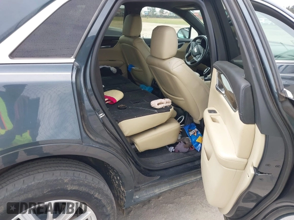 2019 Cadillac XT5 FWD with VIN 1GYKNARS5KZ220991, listed as a IAAI auction lot 41838908 with 75,730 mi miles and . Bid and sale history available at DreamBid. Image 6.