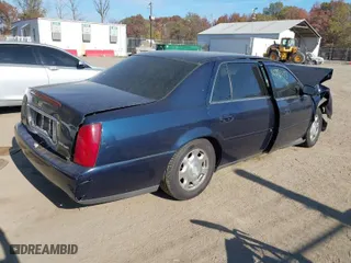 2002 Cadillac DeVille with VIN 1G6KD54Y62U183770, listed as a IAAI auction lot 40775473 with 92,510 mi miles. Bid and sale history available at carsss.com. Image 4.