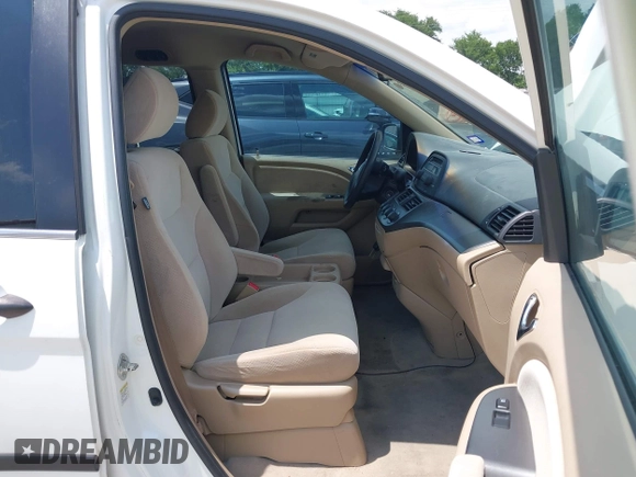 2007 Honda Odyssey LX with VIN 5FNRL382X7B135892, listed as a IAAI auction lot 42223231 with 204,054 mi miles and . Bid and sale history available at DreamBid. Image 5.