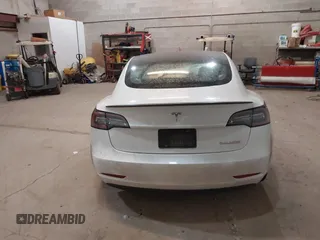 2021 Tesla Model 3 Performance with VIN 5YJ3E1ECXMF991836, listed as a IAAI auction lot 41830519 with Not Provided miles and . Bid and sale history available at carsss.com. Image 16.