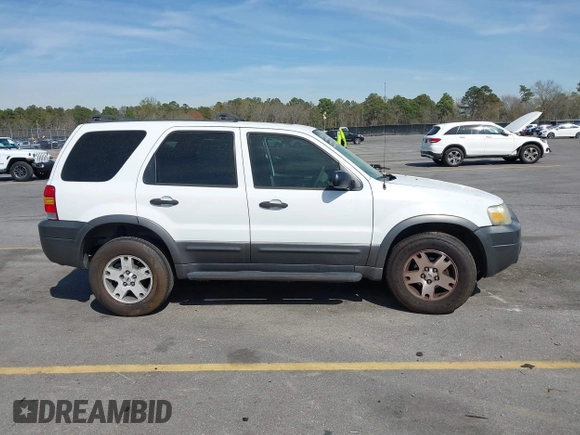 2005 Ford Escape XLT with VIN 1FMYU03165KA93495, listed as a IAAI auction lot 41821975 with 202,475 mi miles and . Bid and sale history available at DreamBid. Image 13.