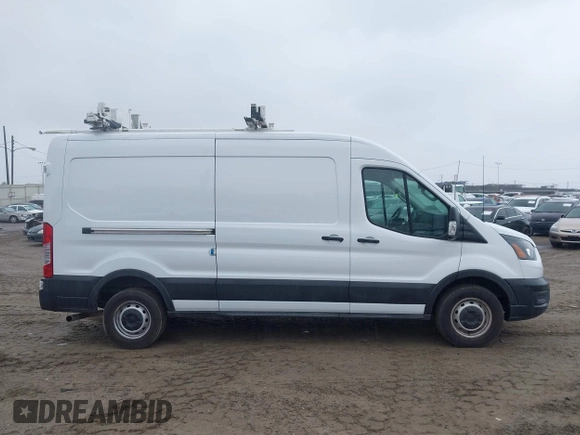 2021 Ford Transit Cargo with VIN 1FTBR1C88MKA52816, listed as a IAAI auction lot 41620731 with 60,716 mi miles and . Bid and sale history available at DreamBid. Image 13.
