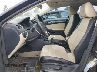 2014 Volkswagen Jetta SEL z VIN 3VWL17AJ8EM440253, wystawiony jako Copart lot #55537115 z przebiegiem 143 980 mil mil oraz Czysty tytuł • Clean title. Historia ofert i sprzedaży dostępna na DreamBid. Obrazek 7.