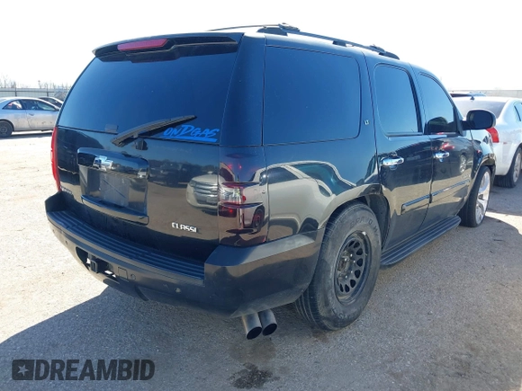 2007 Chevrolet Tahoe LTZ with VIN 1GNFC13J67R245233, listed as a IAAI auction lot 41726159 with 203,841 mi miles and . Bid and sale history available at DreamBid. Image 4.