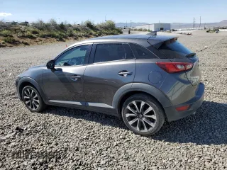 2019 Mazda CX-3 Touring z VIN JM1DKFC72K0430266, wystawiony jako Copart lot #59765545 z przebiegiem 77 534 mil mil oraz Szkoda całkowita • Salvage title. Historia ofert i sprzedaży dostępna na DreamBid. Obrazek 2.