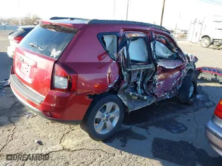 2014 Jeep Compass Sport with VIN 1C4NJCBB0ED893290, listed as a IAAI auction lot 41139356 with 232,646 mi miles. Bid and sale history available at carsss.com. Image 4.