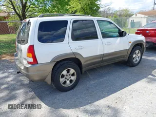2001 Mazda Tribute LX with VIN 4F2YU09131KM12857, listed as a IAAI auction lot 42034605 with 257,015 mi miles and . Bid and sale history available at carsss.com. Image 4.