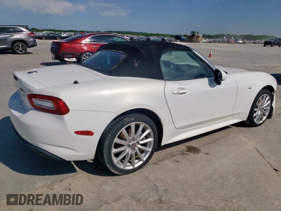 2017 FIAT 124 Spider Elaborazione Abarth z VIN JC1NFAEK0H0105912, wystawiony jako Copart lot #53077885 z przebiegiem 72 652 mil mil oraz Szkoda całkowita • Salvage title. Historia ofert i sprzedaży dostępna na DreamBid. Obrazek 3.
